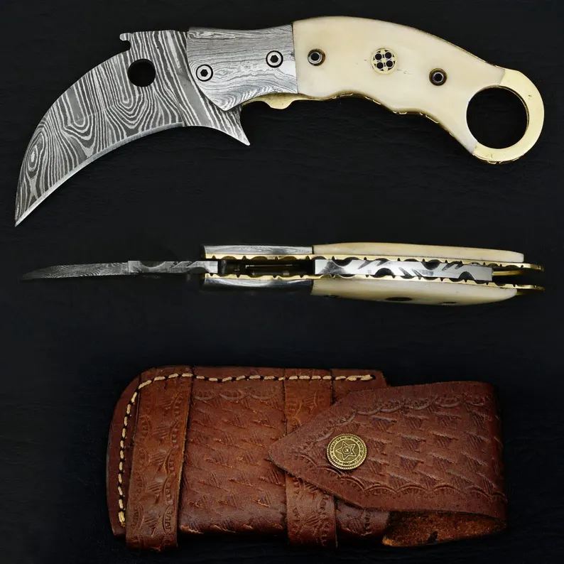 Handmade Damascus Steel Karambit Folding Knife: Camel Bone Handle, Leather Sheath Handmade Damascus Steel Karambit Folding Knife: Camel Bone Handle, Leather Sheath