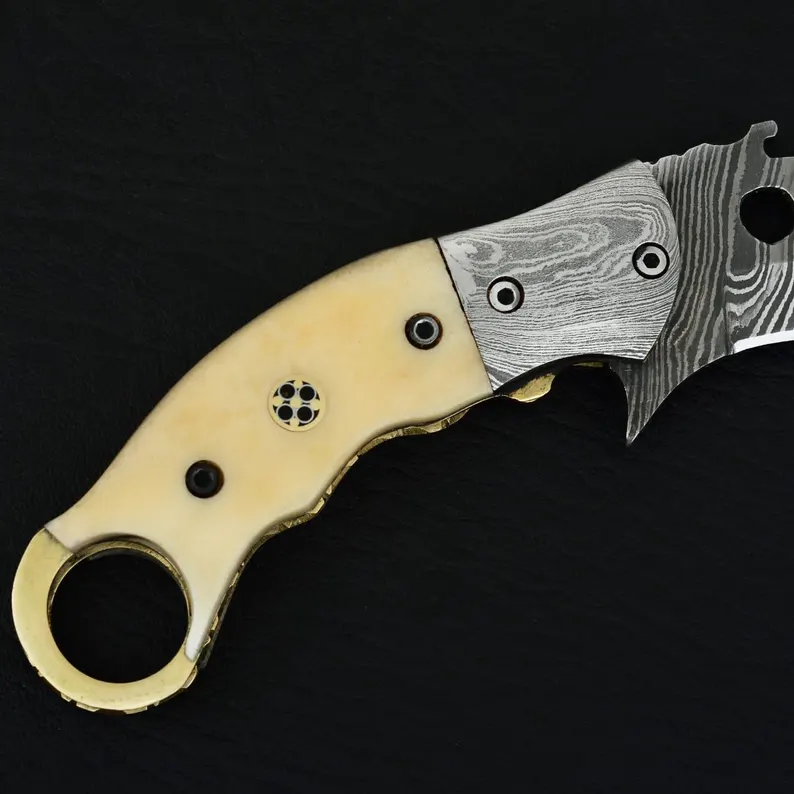 Handmade Damascus Steel Karambit Folding Knife: Camel Bone Handle, Leather Sheath Handmade Damascus Steel Karambit Folding Knife: Camel Bone Handle, Leather Sheath