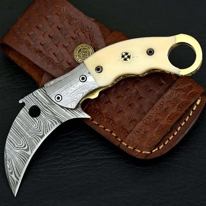 Handmade Damascus Steel Karambit Folding Knife: Camel Bone Handle, Leather Sheath Handmade Damascus Steel Karambit Folding Knife: Camel Bone Handle, Leather Sheath