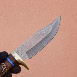 hand forged Damascus steel hunting and camping Skinner knife with stag horn handle and leather sheath. Best gift for him.